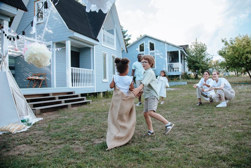 a family playing sack race